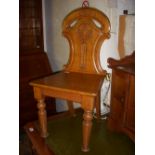 Masonic oak hall chair, carved back.