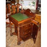 Victorian rosewood Davenport, maple fitted interior; fitted side ink drawer. The base with four