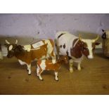 Beswick cow ‘Ickham Bessie’ and Ch. Whitehill Mandate’ with calf, (3)