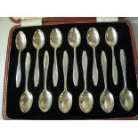 Twelve silver teaspoons, cased set.