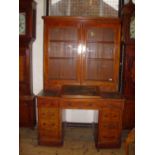 Victorian glazed mahogany bookcase with kneehole desk.