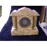 19th Century polished marble chiming timepiece.