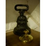 Victorian cast iron doorstop; brass paperweight.
