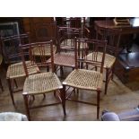 Set of seven Victorian occasional chairs in manner of  William Morris. Imitation cane turning to