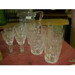 Crystal glass jug, five tumblers and four sherry glasses.