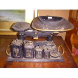Set of Victorian cast-iron scales with weights.