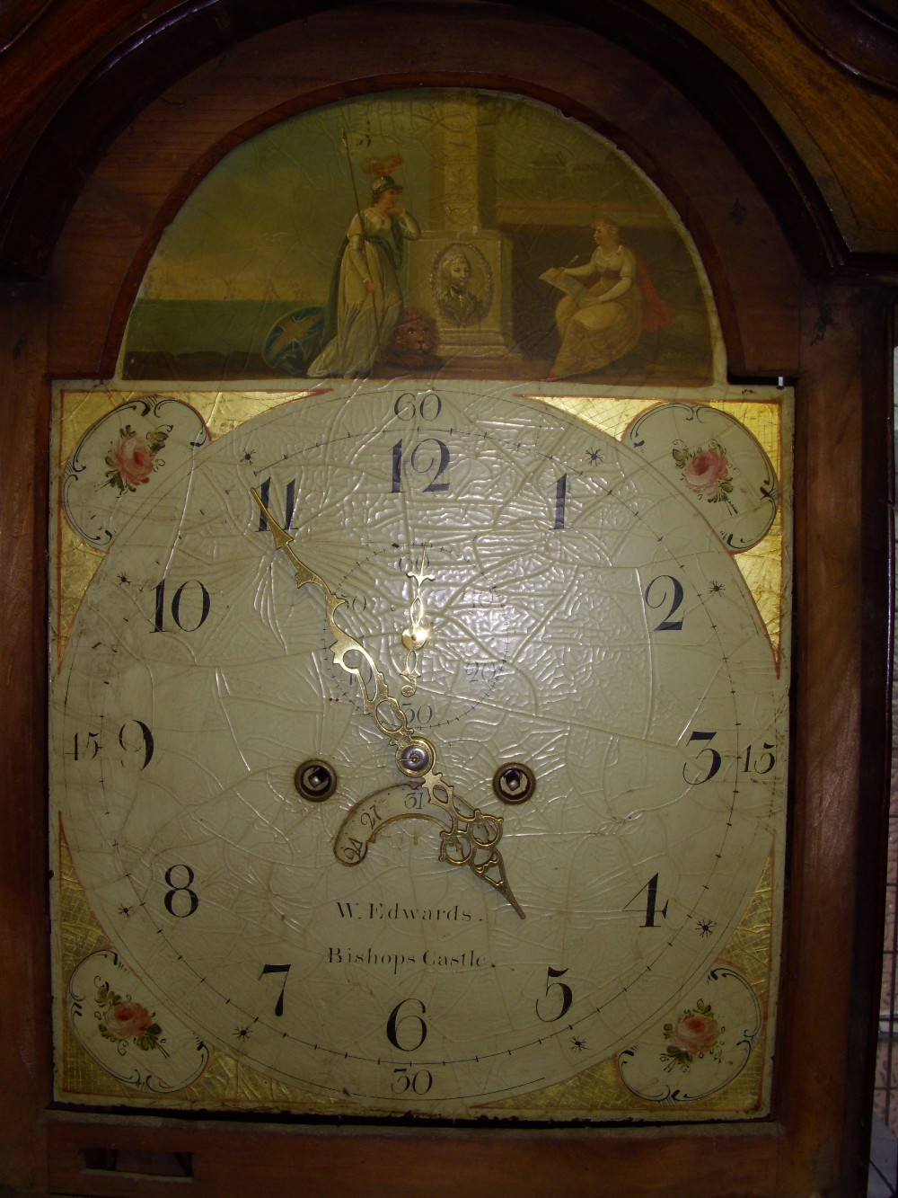 Georgian oak and mahogany longcase clock, arched painted dial, eight-day movement, signed W.