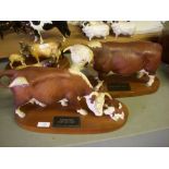 Beswick Hereford Connoisseur model bull, and cow and calf. (2)