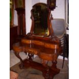 Victorian walnut dressing table, shaped mirror above drawers, the base with single drawer,