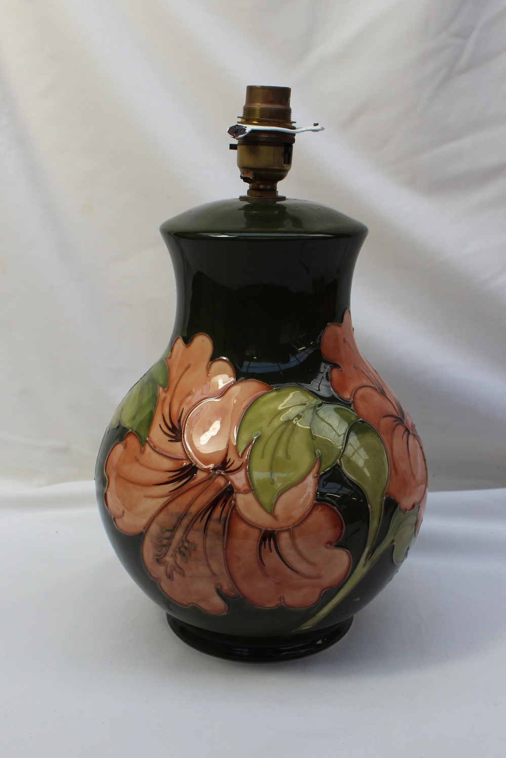 A Moorcroft Hibiscus pattern table lamp,