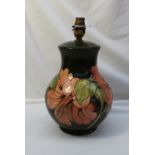 A Moorcroft Hibiscus pattern table lamp,