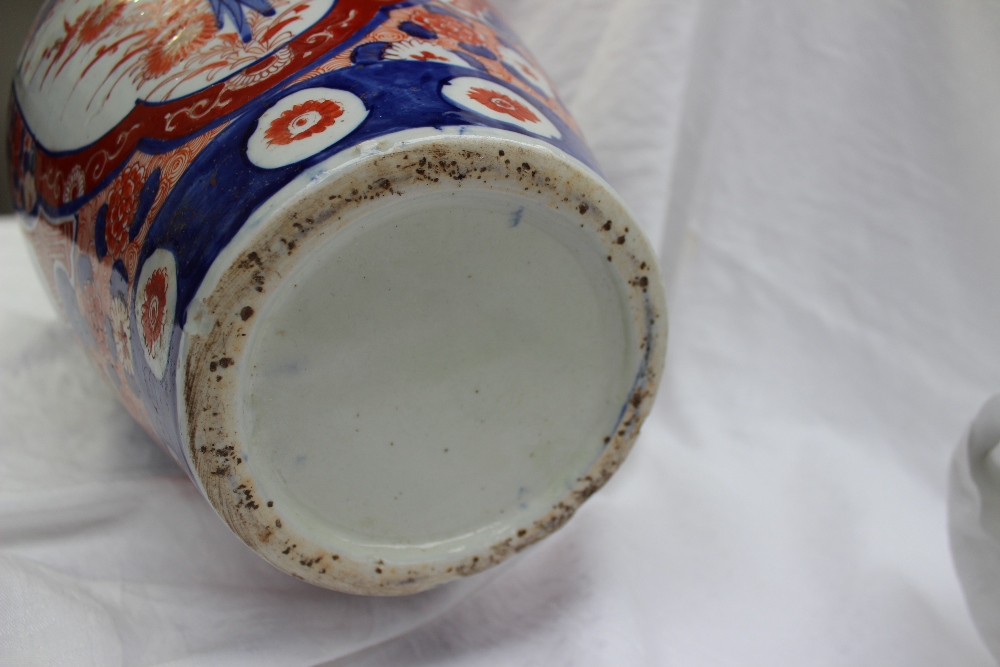 A large 19th century Japanese Imari porcelain baluster vase, decorated with prunus blossom and - Image 6 of 6