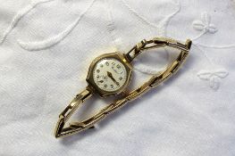 A lady's 9ct yellow gold wristwatch, the