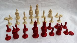 A 19th century bone chess set with reel