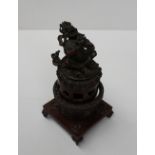 A Sino Tibetan bronze incense burner wit