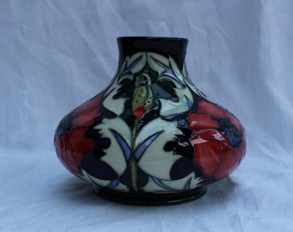 A modern Moorcroft pottery vase of squat form in the poppy design, impressed and painted marks dated - Image 2 of 3