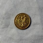 An Edward VII gold sovereign dated 1903,