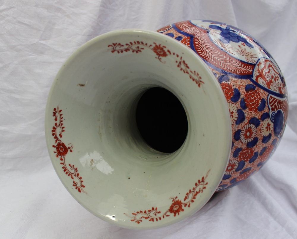 A large 19th century Japanese Imari porcelain baluster vase, decorated with prunus blossom and - Image 5 of 6