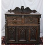 A 19th century continental carved oak si