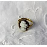 A Victorian shell cameo ring carved with