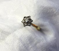 A diamond cluster ring set with a centra