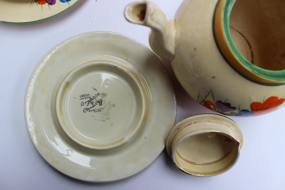 A Clarice Cliff matched crocus pattern part tea and dessert set comprising a teapot and stand, three - Image 5 of 6