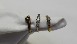 A five stone diamond ring set with gradu