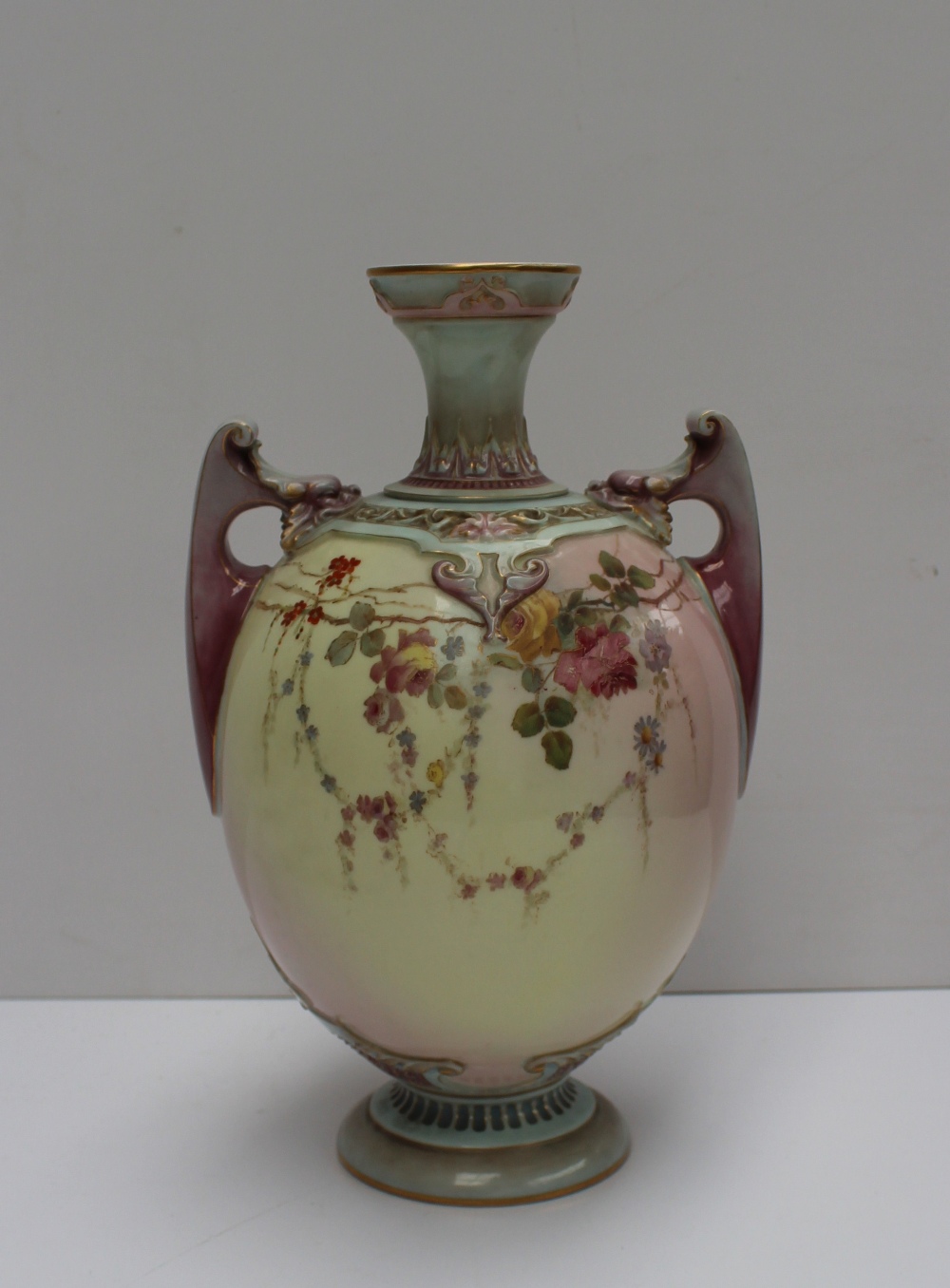 A Royal Worcester Prismatic enamels porcelain twin handled vase, transfer and infil decorated with - Image 2 of 4