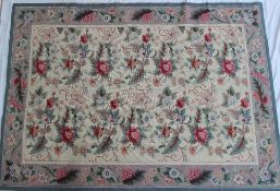 An Aubusson tapestry style rug decorated