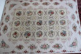 An Aubusson tapestry style rug decorated