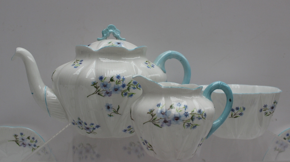 A Shelley part tea set decorated in the Blue Rock pattern No.13591, including a teapot, oval dish, - Image 3 of 4