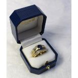 An sapphire and diamond dress ring, set