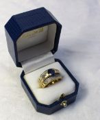 An sapphire and diamond dress ring, set