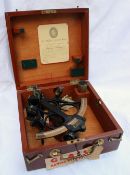 A cased black lacquered and brass sextant by Heath & Co, of New Eltham, London, S.E.9 the pierced