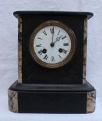 A Black slate clock, of rectangular form with veined marble pillasters, the enamel dial with Roman