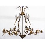 A 19th century ormolu and glass six branch chandelier, with cast rams head terminals, cut glass