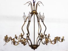A 19th century ormolu and glass six branch chandelier, with cast rams head terminals, cut glass