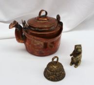 A copper wine pot the cover with a stepp