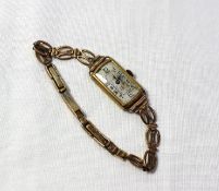 A lady's 18ct yellow gold wristwatch the