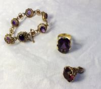 An amethyst dress ring, the large oval f