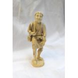An 19th century Japanese ivory figure of