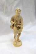 An 19th century Japanese ivory figure of