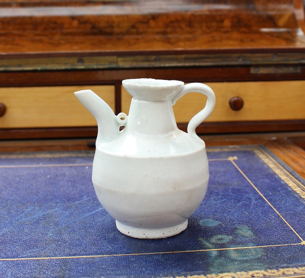 A 19th century Chinese porcelain white glazed jug with a tapering neck, ribbed body and spreading - Image 4 of 5