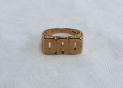 A 9ct yellow gold ring, pierced DAD to t
