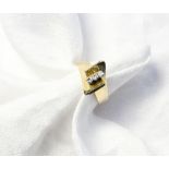 A three stone diamond ring to a 14ct yel