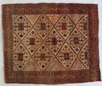 A small cream ground rug, with a central