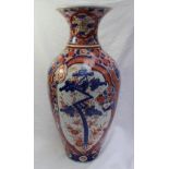 A large 19th century Japanese Imari porcelain baluster vase, decorated with prunus blossom and