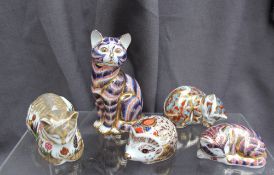 A Royal Crown Derby paperweight Cottage Garden Cat, together with three other cat paperweights and a