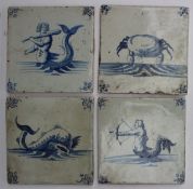 A set of four Delft tiles, decorated wit