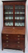 A George III mahogany bureau bookcase, t